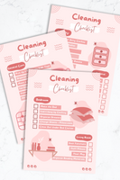 Image of three of the pages for the Cleaning and Organization Checklist. They're splayed out on a marble background and have a pretty pink colored theme. There are also cute images of household items on the pages.